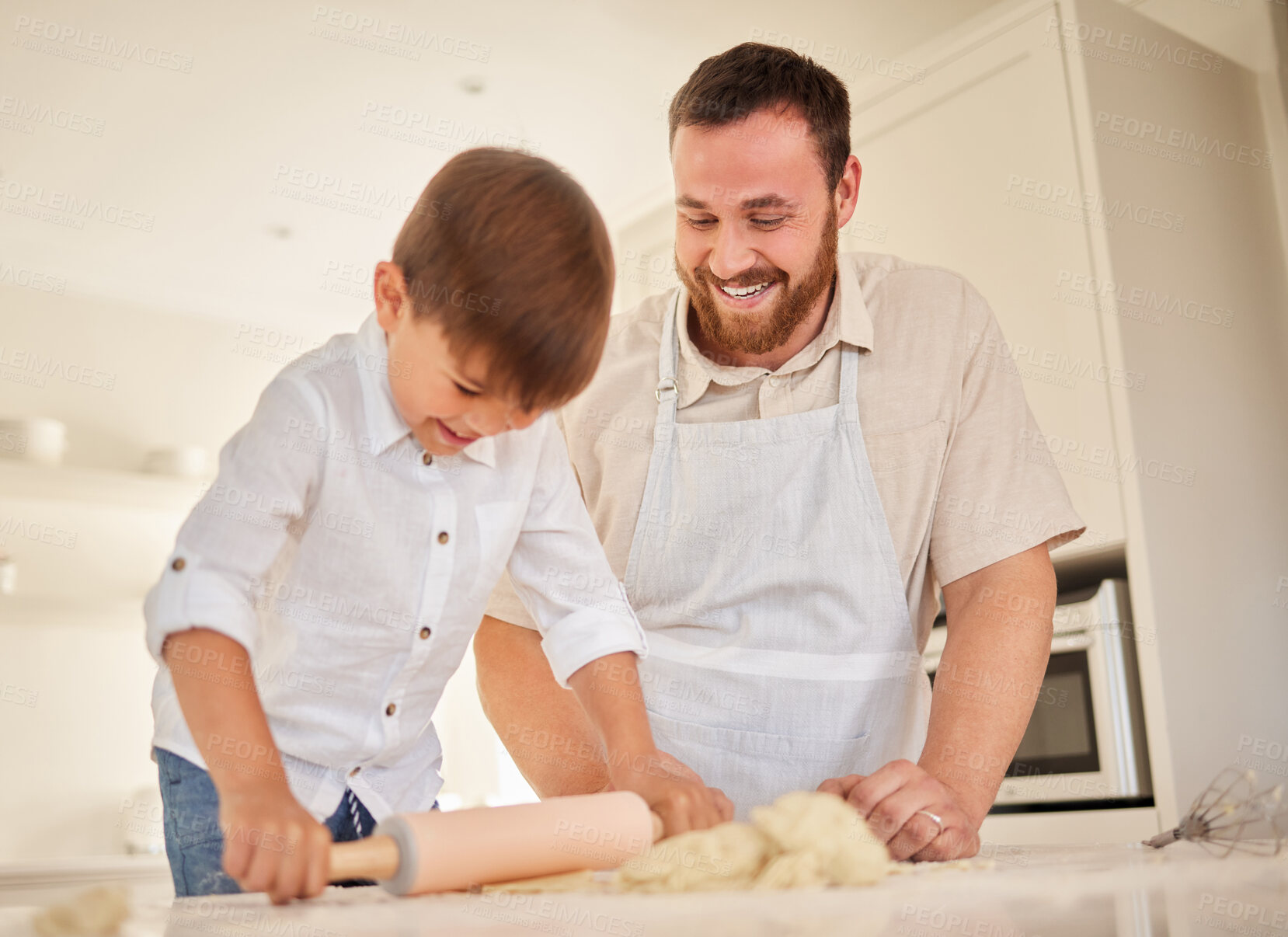 Buy stock photo Father, son and rolling dough in kitchen, flour and pastry or food preparation in home. Happy daddy, boy and support in child development, bonding and learning skill or ingredients for cake baking