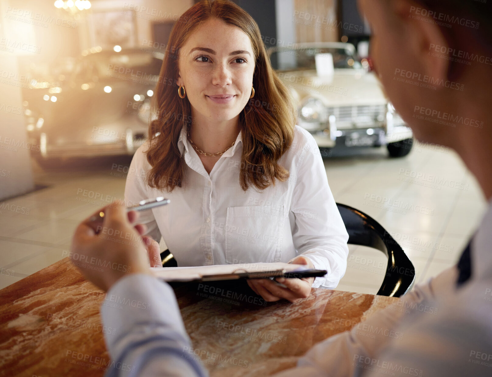 Buy stock photo Car salesman, contract and pen for woman with deal, loan and finance for classic vehicle in showroom. Man, documentation or paperwork for client, sale and agreement for lease, payment and signature