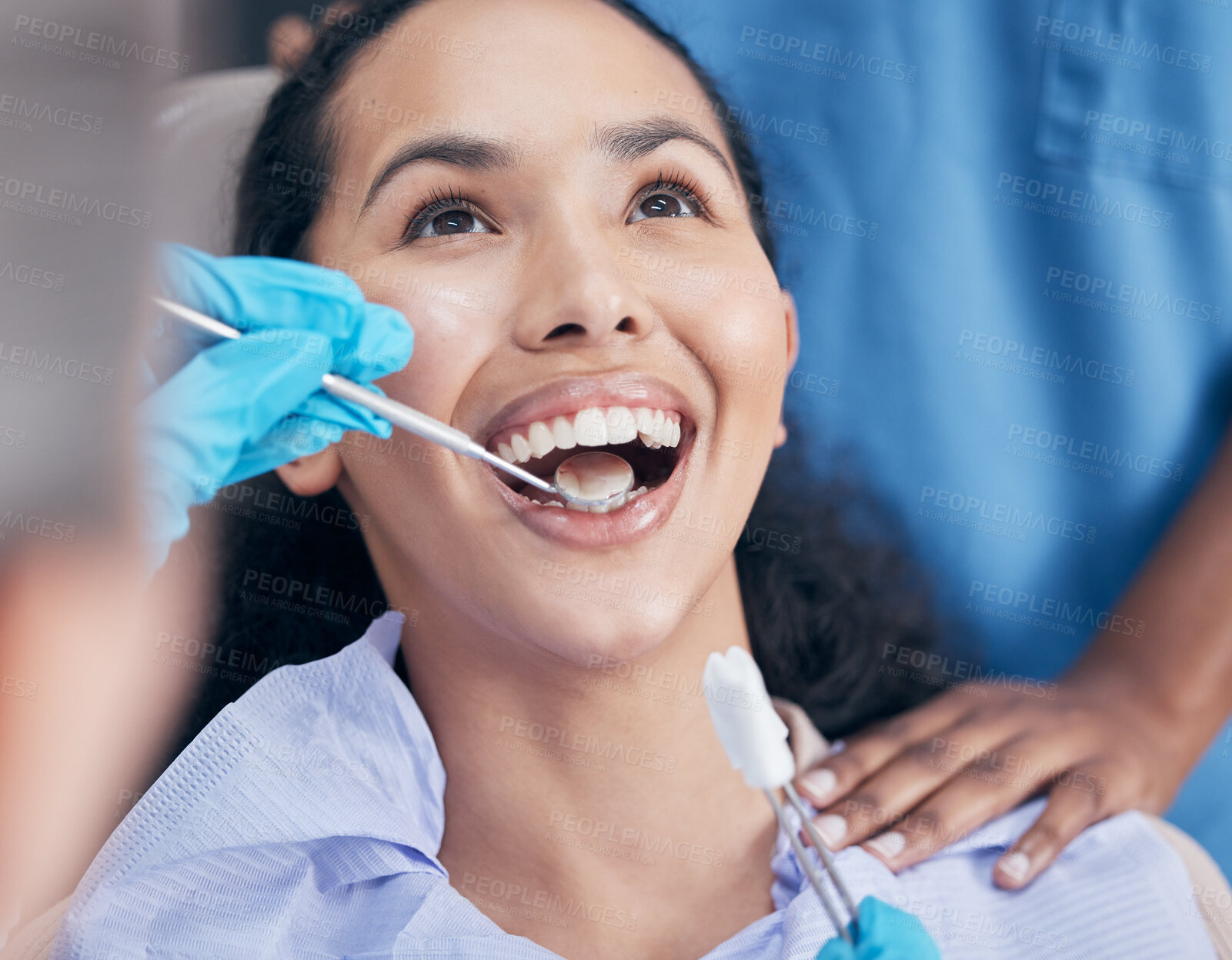 Buy stock photo Dental checkup, woman and dentist with procedure, oral hygiene and appointment for teeth whitening. Happy, professional and medical with patient in chair, equipment and remove plaque for gum disease