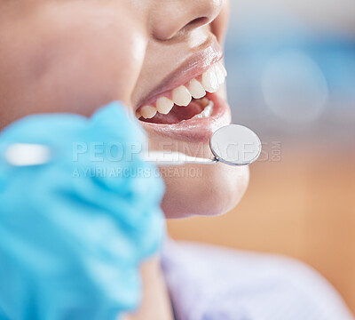 Buy stock photo Shot of a woman about to have her teeth checked by the dentist