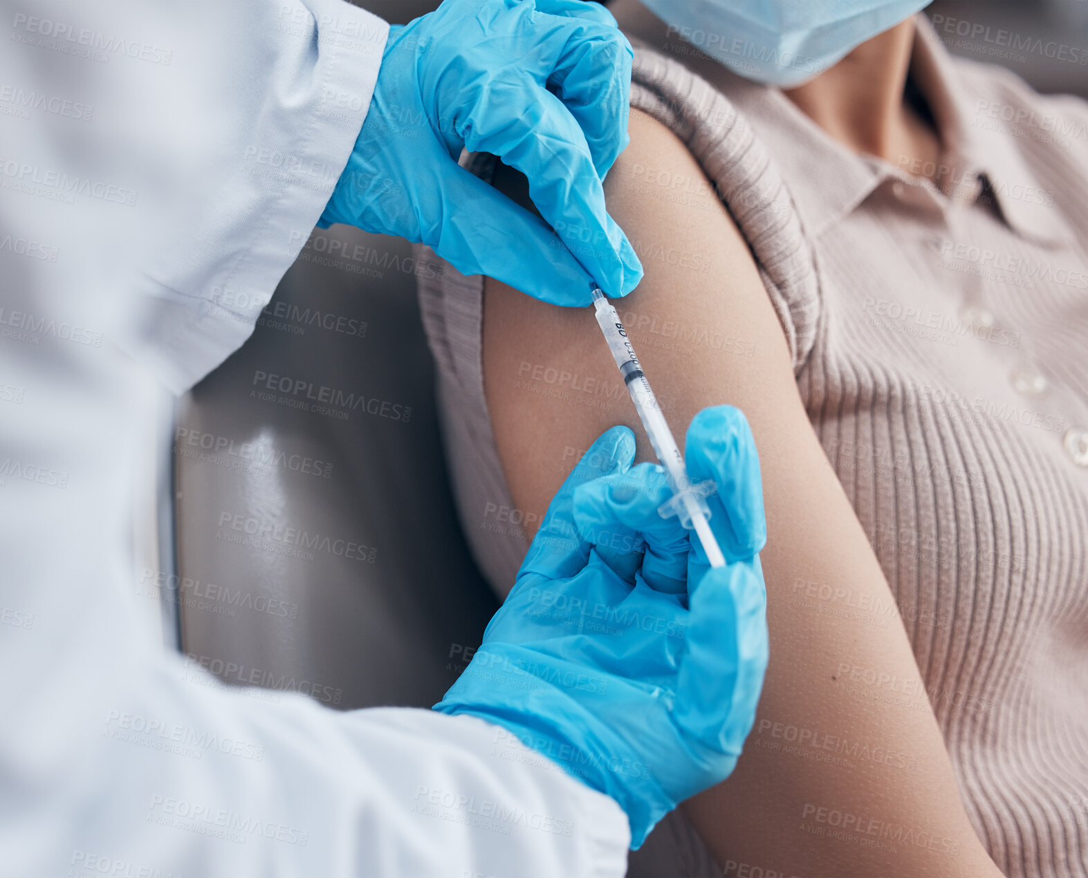 Buy stock photo Hands, medical and doctor with patient for vaccine in clinic for healthcare, treatment and prevention. Closeup, woman and injection with needle for flu shot, medicare and syringe in hospital