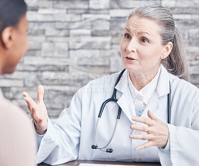 Buy stock photo Shot of a doctor having a consultation with a patient in a medical office
