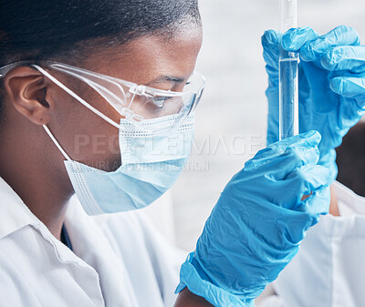 Buy stock photo Black woman, science and research in lab with test tube for medical innovation and ppe safety for chemistry experiment. African lady, scientist and pharmaceutical study with liquid sample for vaccine