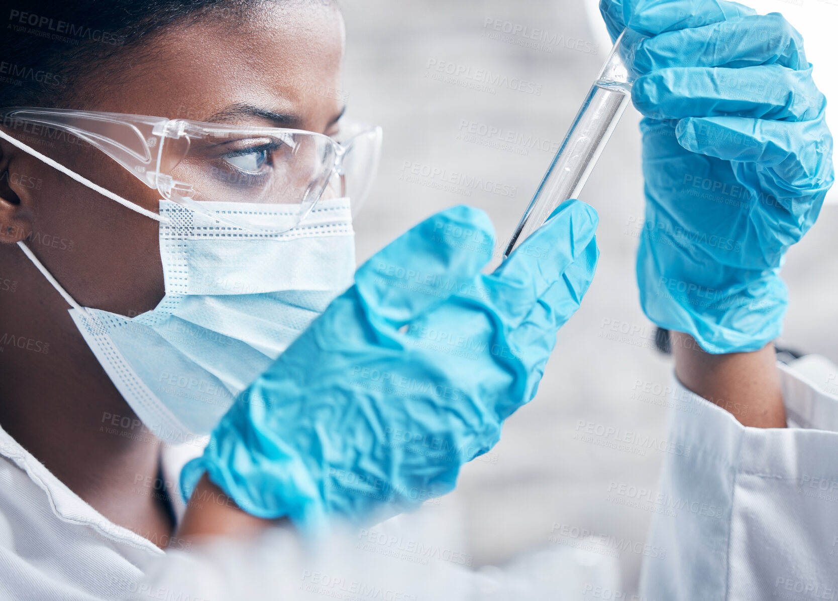 Buy stock photo Black woman, scientist and research in lab with test tube for medical innovation and ppe safety for chemistry experiment. African lady, science and pharmaceutical study with liquid sample for vaccine