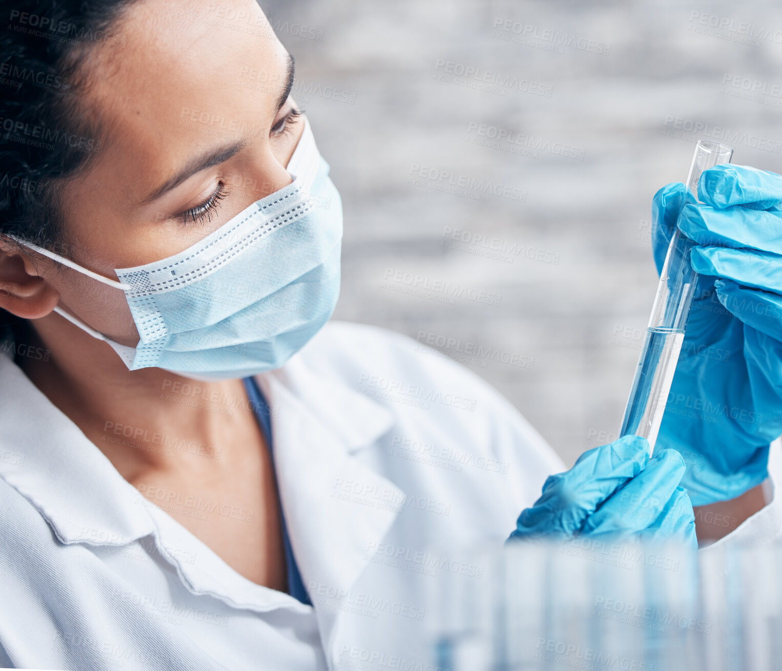 Buy stock photo Woman, science and research in lab with test tube for medical innovation and ppe safety for chemistry experiment. Face mask, scientist and pharmaceutical study with liquid dna sample for vaccine