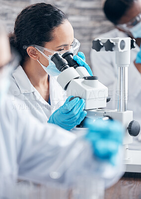 Buy stock photo Woman, scientist and research with microscope for investigation and medical innovation with ppe safety in lab. Female person, healthcare expert and virus or bacteria analysis for vaccine development