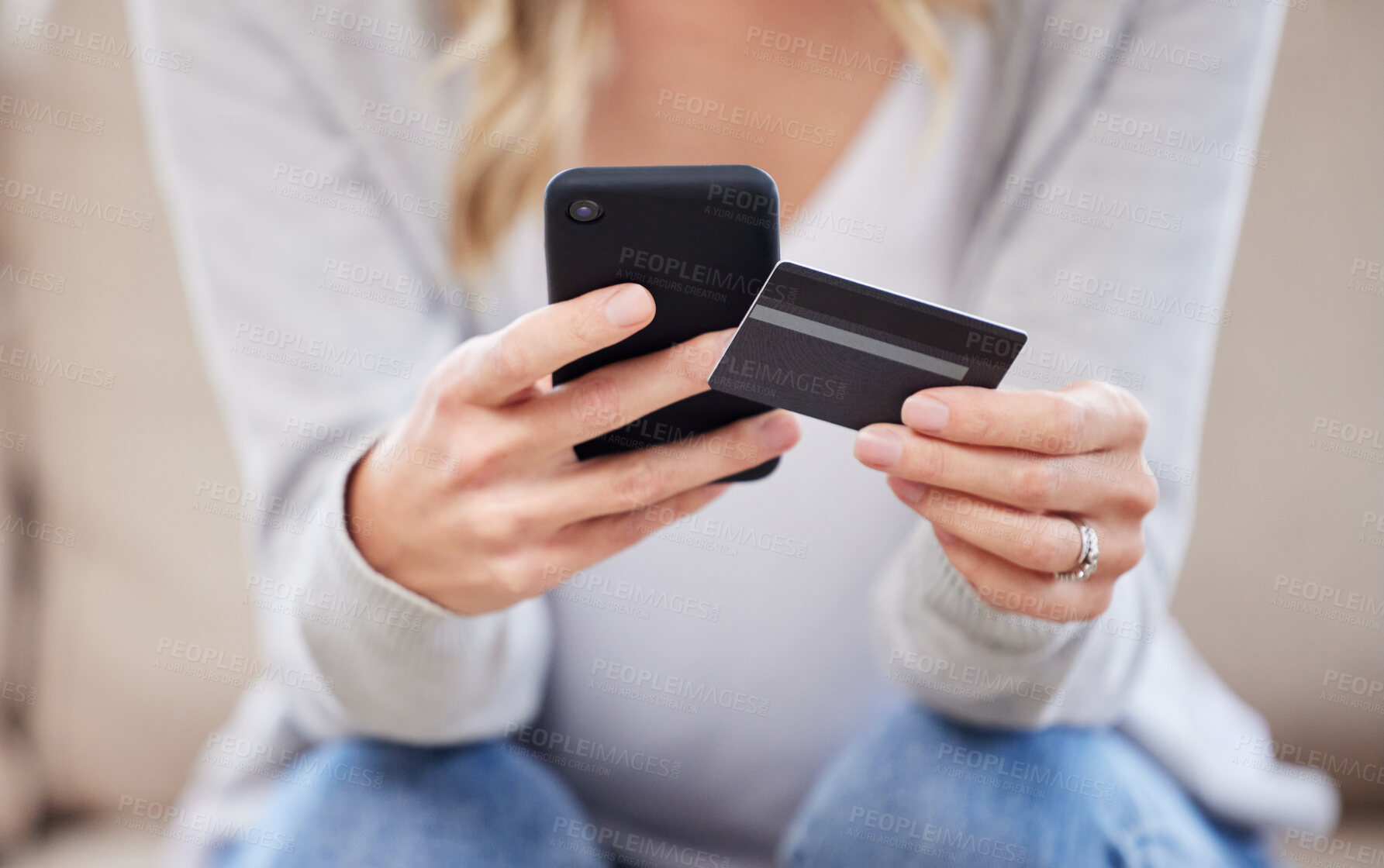 Buy stock photo Credit card, mobile and hands of woman on sofa for online shopping, e commerce or transaction in living room. Payment, app and female person for purchase, subscription or internet banking in home