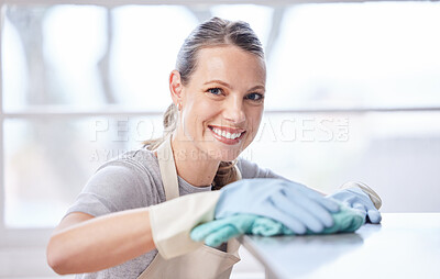 Buy stock photo Hygiene, portrait and woman wipe kitchen counter with cloth for cleaning, remove bacteria or chores. Smile, sanitizer and person with spray bottle for housekeeping, detergent or disinfect in home