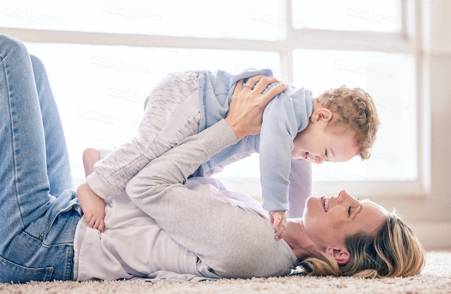 Buy stock photo Mother, baby and boy for playing in home, childcare and support or love on bedroom floor. Mama, son and single parent for security or bonding on carpet for connection in relationship, care and trust