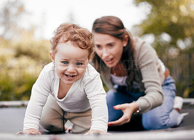 Buy stock photo Shot of a mother and son playing outside