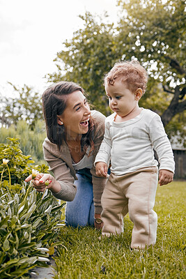 Buy stock photo Shot of a mother and son playing outside