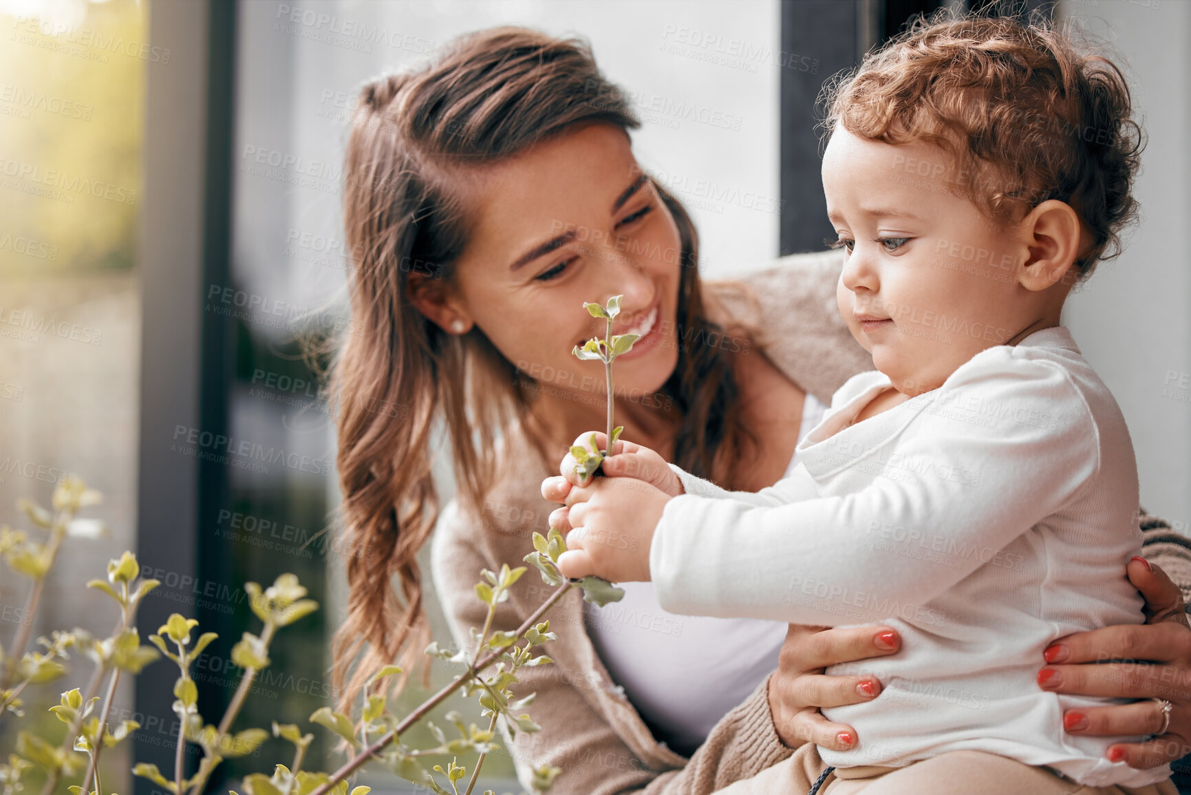 Buy stock photo Happy woman, baby and together on porch for love, development and bonding at home. Mom, curious boy and touching plants outside for growth, trust and smiling with hug for joy, protection and wellness