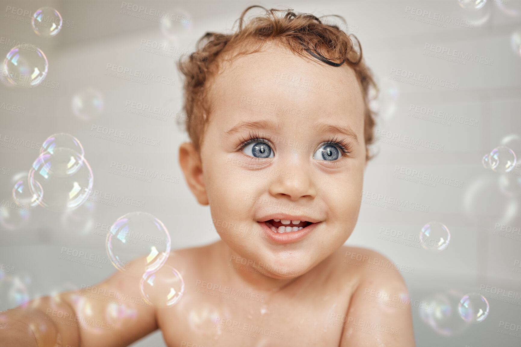 Buy stock photo Bubbles, baby and cute in bathroom for bath, cleaning and hygiene with night time routine for growth or development. Toddler, home and washing in bathtub for skin care, happiness and wellness.