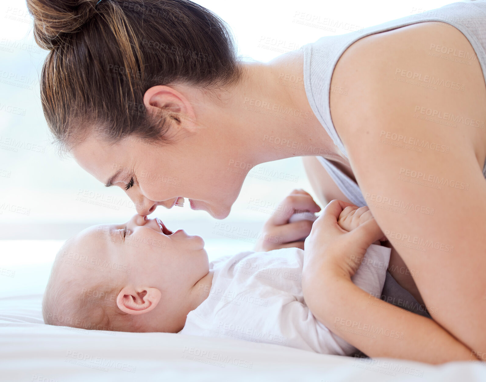 Buy stock photo Baby, mother and nose kiss in bed for love, support and bonding together in morning at home. Family house, woman or mama with boy infant in nursery for laugh, connection and care for happy kid