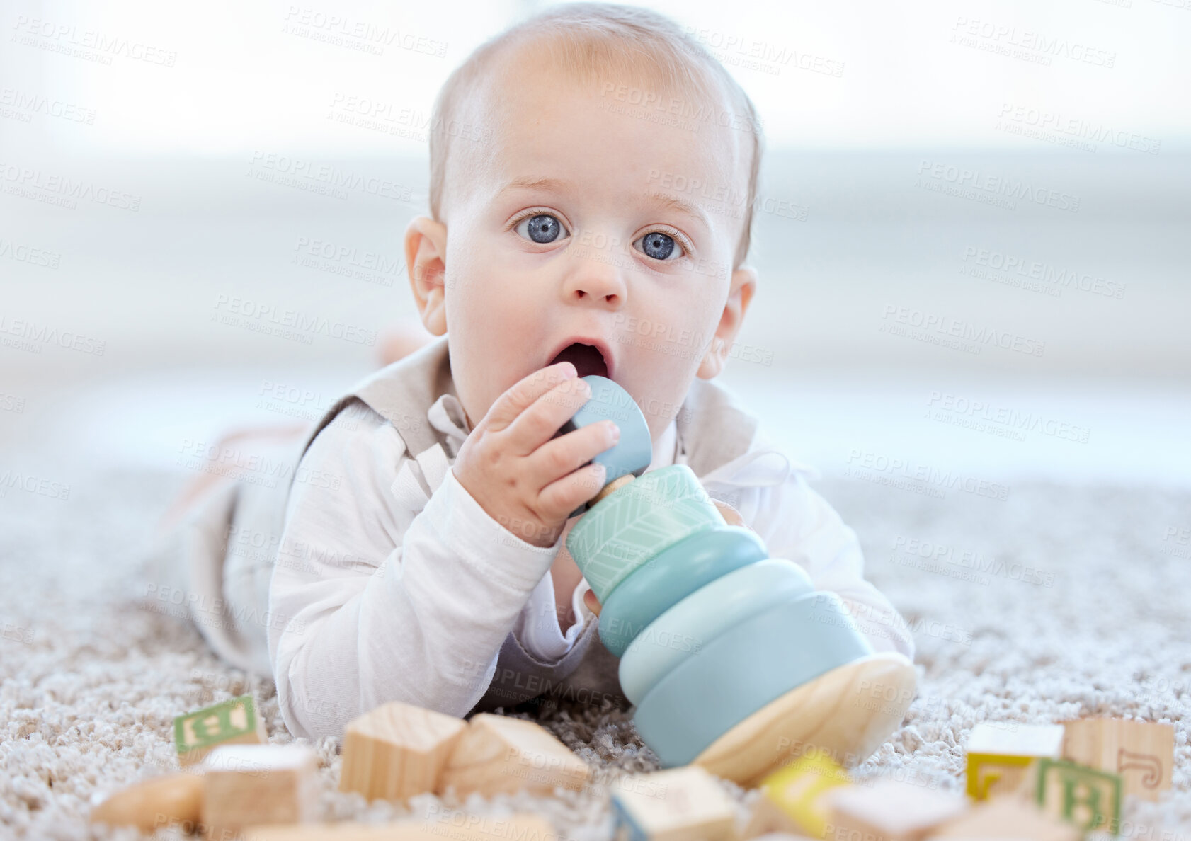 Buy stock photo Portrait, baby and child on floor in with building blocks in living room for development, growth or playing. Fun, young kid with wooden toys for motor skills, education or learning alphabet in home