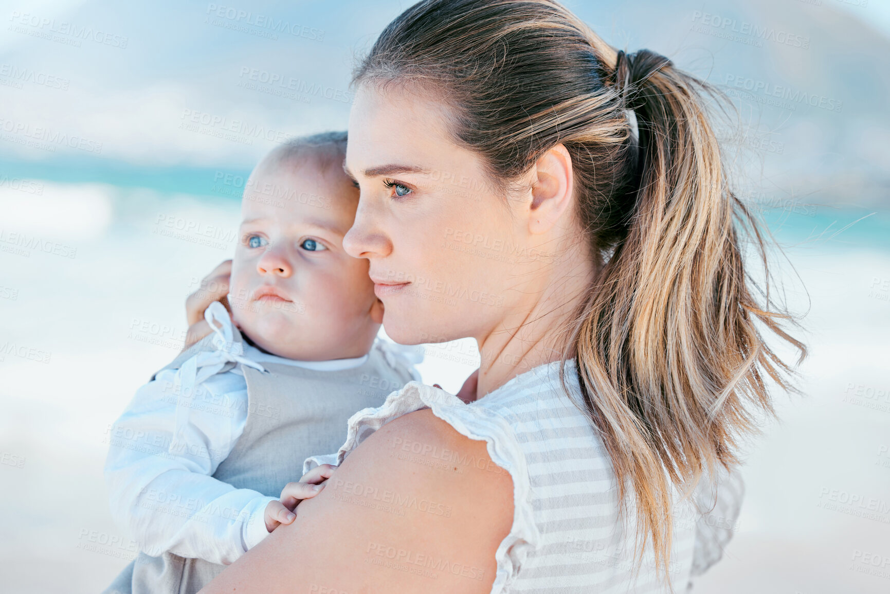 Buy stock photo Profile, woman and child by ocean together for care, love and support or happiness at beach. Family, baby and female person or mama in nature for childhood, development and adventure in summer 