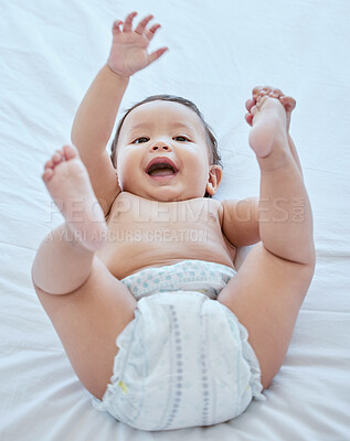 Buy stock photo Happy, laughing and baby on bed in home for child development, wellness and growth. Family, childhood and closeup of young infant in bedroom to change diaper with smile, playing and relax in house