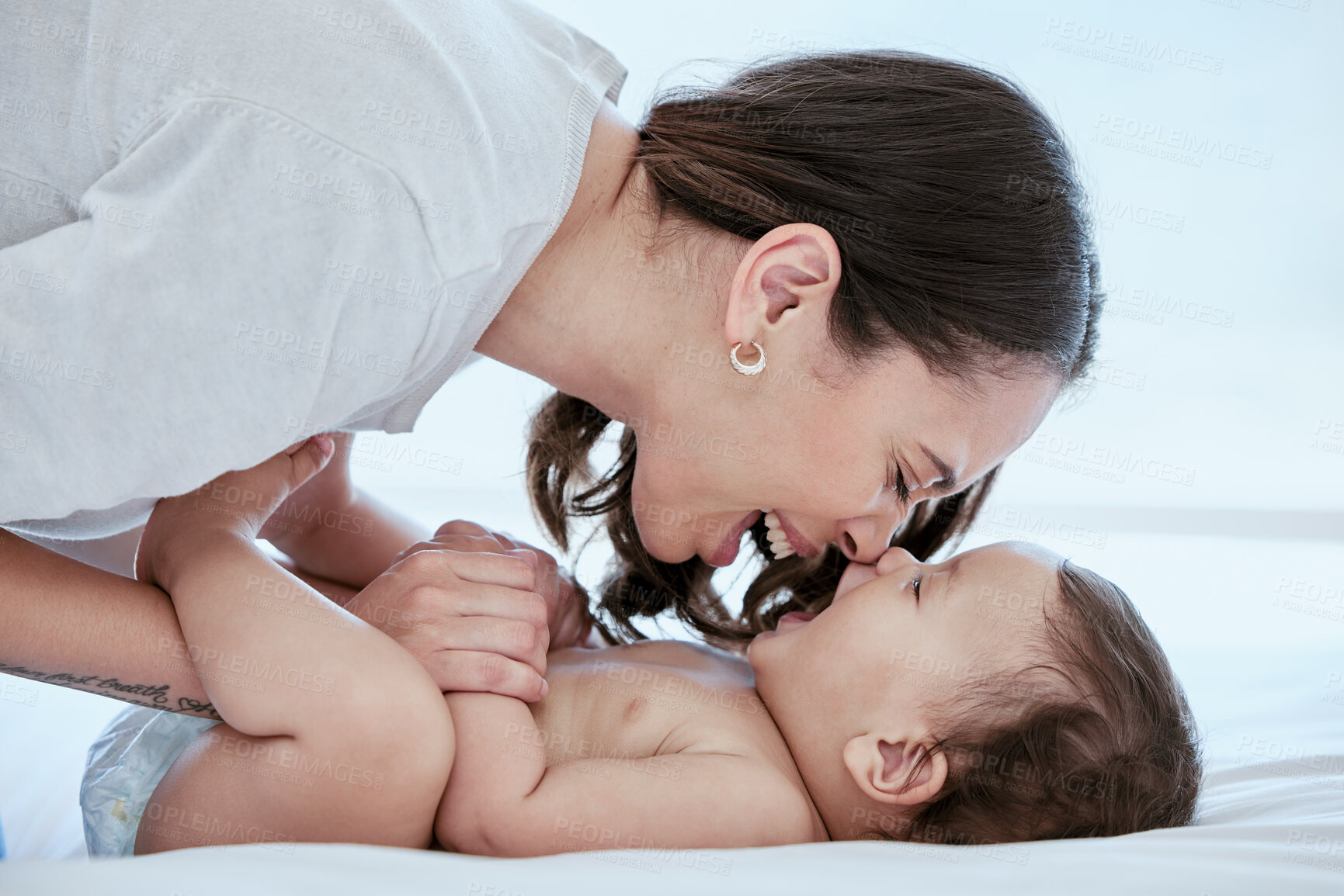 Buy stock photo Home, mom and baby on bed with playing, bonding and laughing together with happy toddler. Smile, mother and infant girl relax in bedroom with fun for growth, love and support in child development