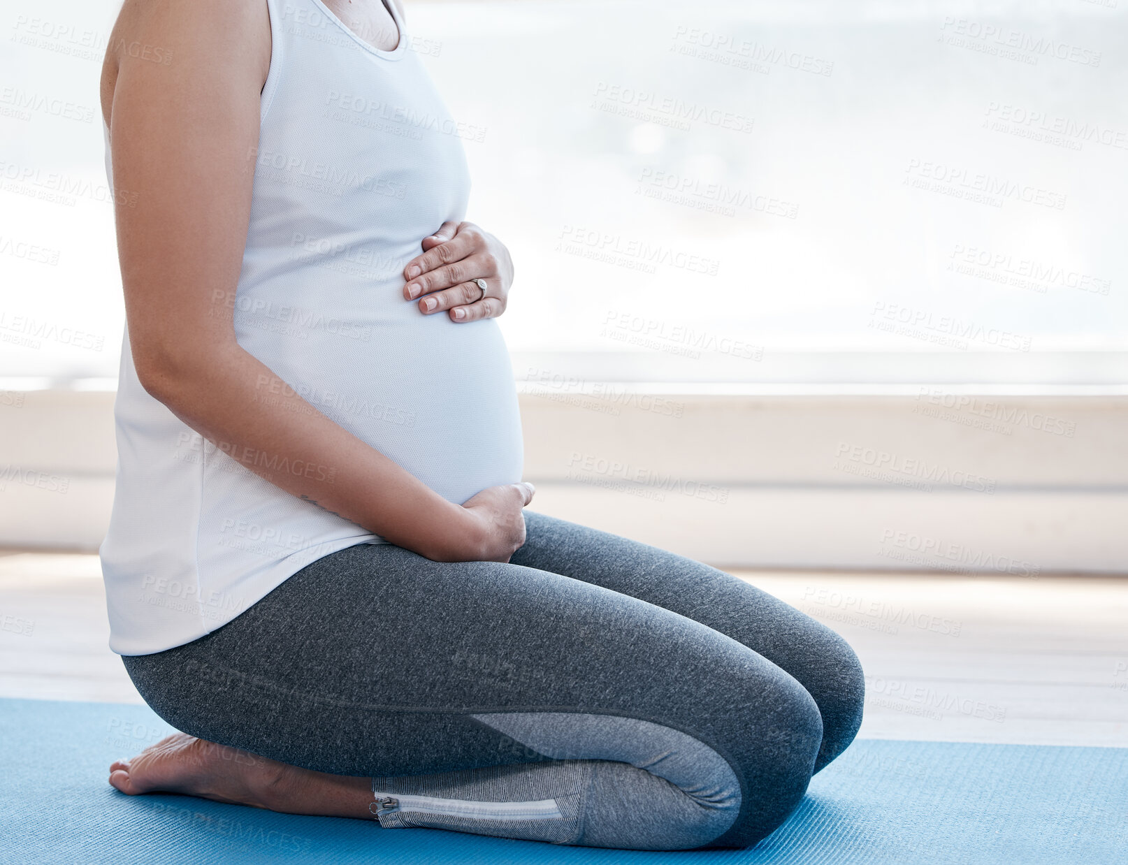 Buy stock photo Prenatal, yoga and mother with hands on stomach for bonding with baby with meditation or zen on floor. Holistic wellness, woman and belly with pilates for mental health, maternity or wellbeing on mat