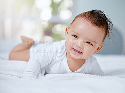 Buy stock photo Shot of a little baby playing on her bed