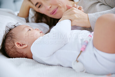 Buy stock photo Shot of a mother spending time with her baby