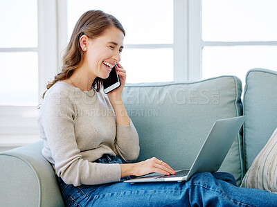 Buy stock photo Cropped shot of an attractive young woman making a phonecall while relaxing on the sofa at home
