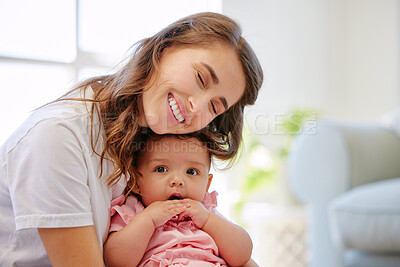 Buy stock photo Shot of a mother and child bonding at home
