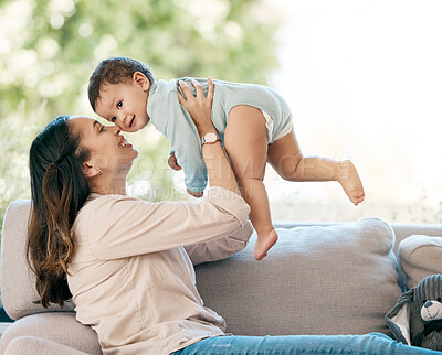 Buy stock photo Love, airplane and mother with baby on a sofa for games, playing and laughing in their home together. Family, smile and mom with girl toddler on a couch, relax and flying, fun and hug in living room