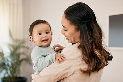 Buy stock photo Family, love and mother holding baby for bonding, quality time and loving embrace together at home. New born, motherhood and happy mom carry infant for care, support and affection in living room