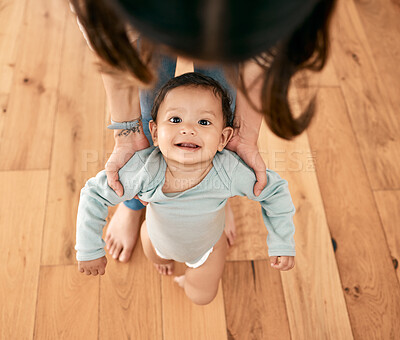 Buy stock photo Shot of an adorable baby learning to take her first steps