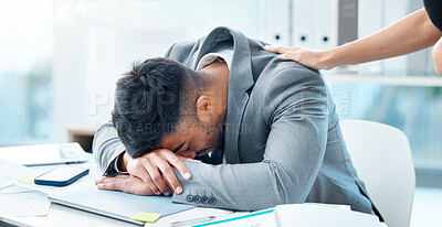 Buy stock photo Shot of a young businessman sleeping at his desk in an office