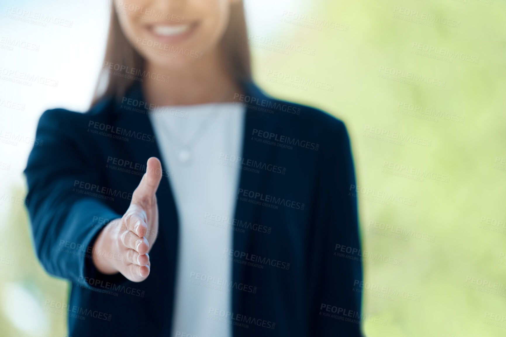 Buy stock photo Closeup shot of an unrecognisable businesswoman extending a handshake in an office
