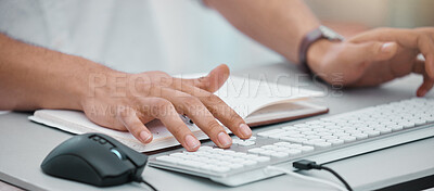 Buy stock photo Closeup shot of an unrecognisable businessman working on a computer in an office