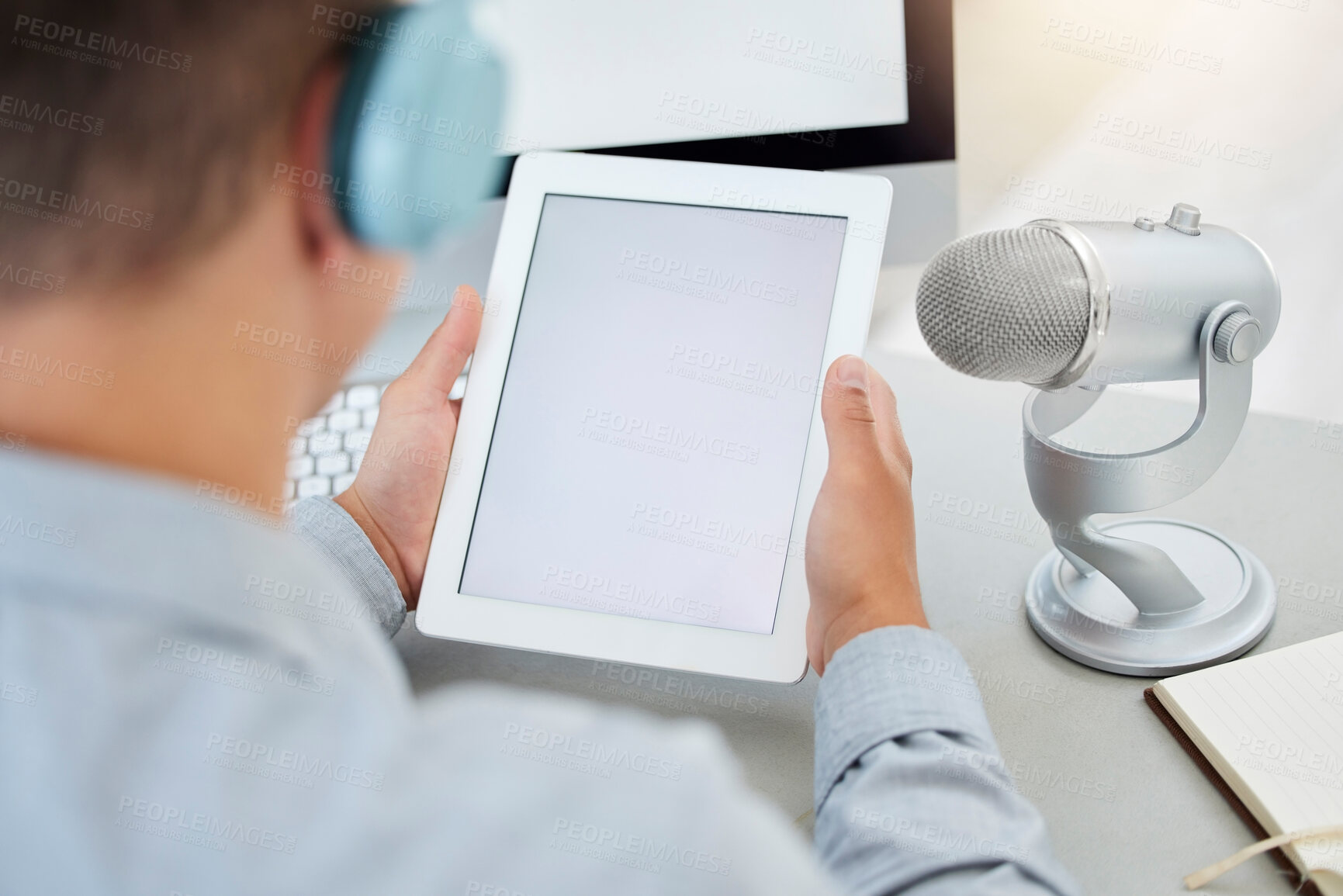 Buy stock photo Mockup on tablet, microphone or man on a podcast, online radio or or live streaming on broadcast network. Influencer host, mockup space or reporter reading or speaking of digital news blog on screen