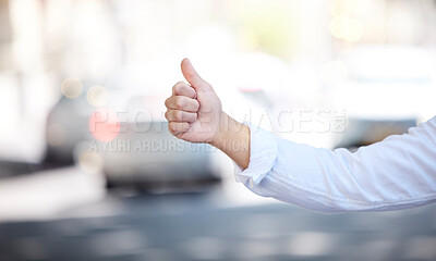 Buy stock photo Entrepreneur, thumbs up or hand of person for taxi, attention or hail in city on morning work commute. Bus, stop and worker with finger sign on street for hitchhiking, calling or waiting for cab