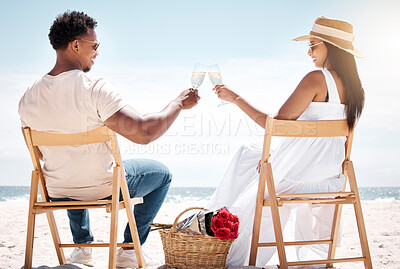 Buy stock photo Shot of a young couple celebrating their engagement at the beach