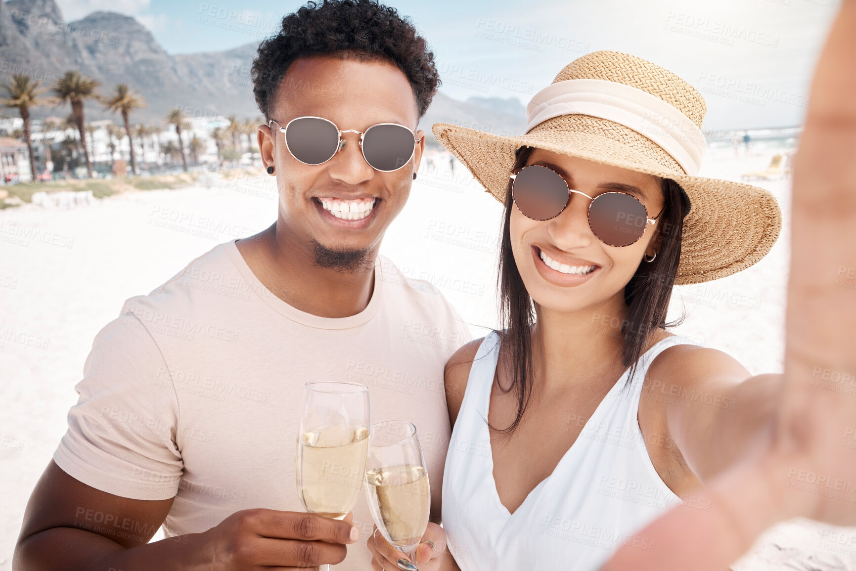 Buy stock photo Couple, selfie and happy at beach with champagne glasses for holiday and honeymoon in Bali. People, relationship and smile with toast for anniversary celebration on vacation, break and bonding