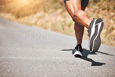 Buy stock photo Shot of a unrecognizable man running outside