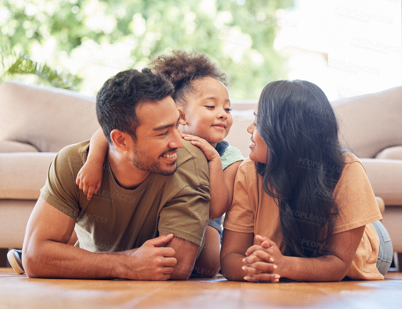 Buy stock photo Relax, child and parents on floor for support, development and love or care in family home. Smile, young girl and together in living room for happiness with mother, father and safety in lounge