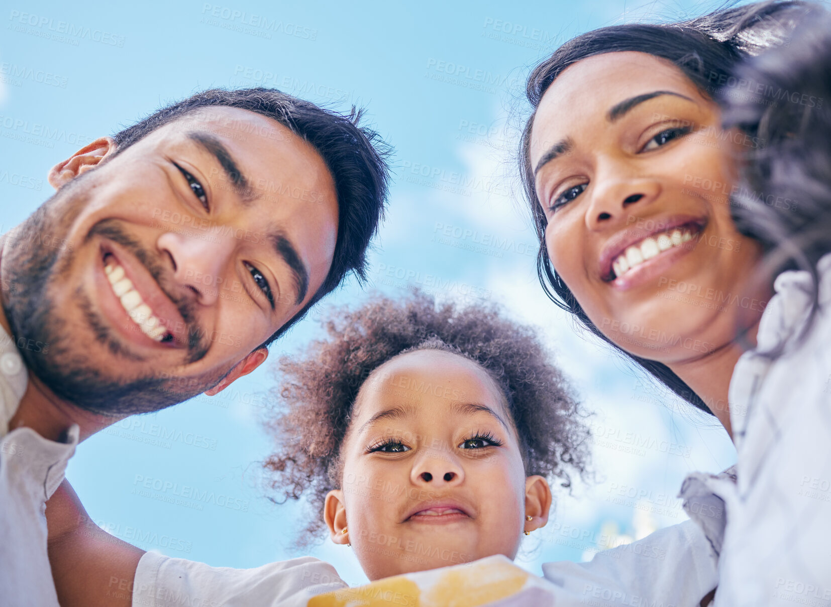 Buy stock photo Closeup shot of a young couple and their adorable daughter