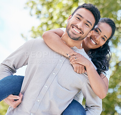 Buy stock photo Shot of a young couple spending time together outdoors