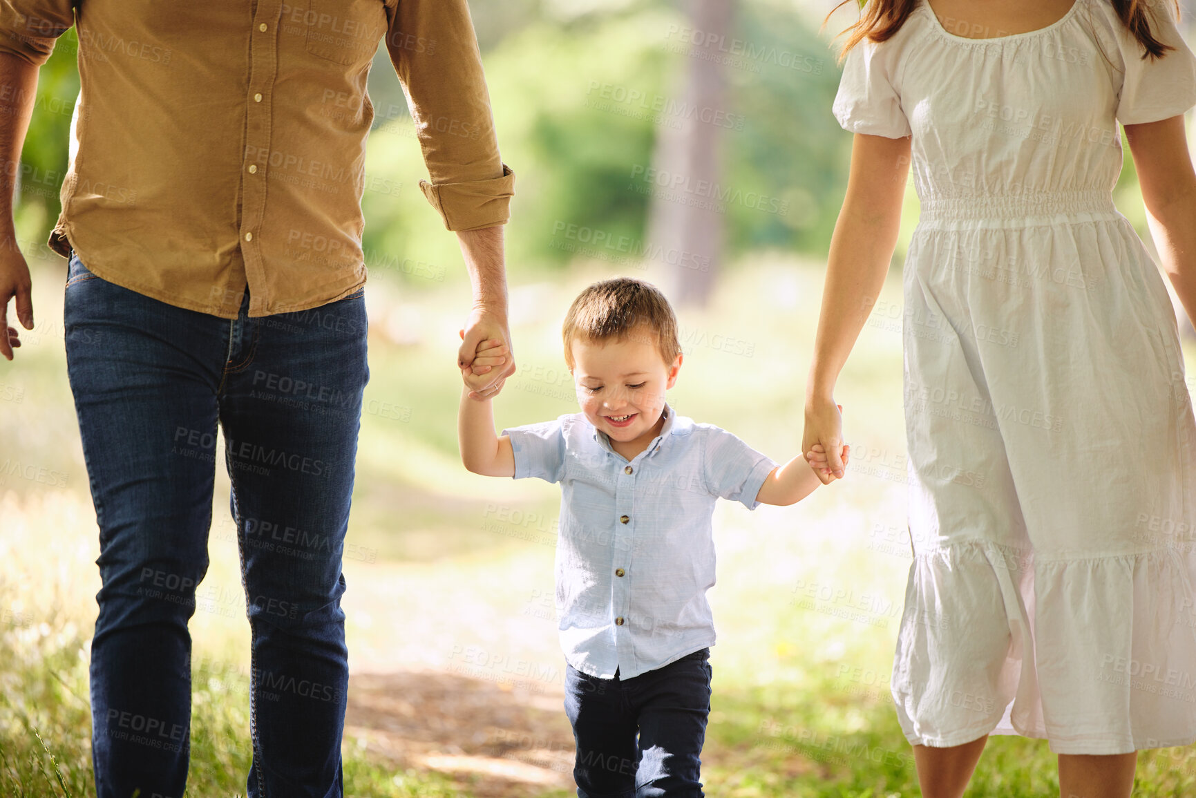 Buy stock photo Parents, boy and happy with walking in park for fun, break and holiday for child development and growth. People, couple and kid or son with smile in outdoor on vacation, day  bonding and support