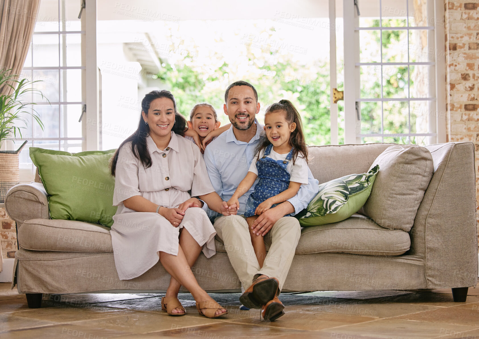 Buy stock photo Portrait, parents and happy family with children on sofa to relax, bonding and love in home. Mother, father and siblings laugh in living room together for connection, support or holding hands of girl