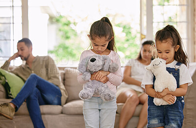 Buy stock photo Parents, fighting and sad girls in living room with teddy bear for support or comfort. Family, divorce and husband in argument with wife and scared kids in fear, stress or depression in lounge