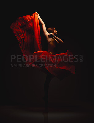 Buy stock photo Dancing, woman and ballet dress flow in studio with performance, turn and dark background with balance. Red, art and fabric with ballerina routine of dancer and performer with costume and creativity 