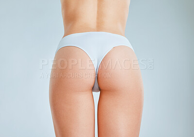 Buy stock photo Cropped shot of an unrecognizable woman posing in her panties