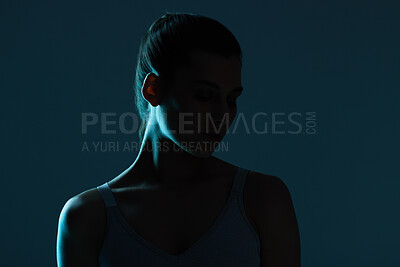 Buy stock photo Silhouette, woman and face in studio with beauty mystery, cosmetics and art deco aesthetic with mockup space. Model, female person and natural glow on skin for fantasy and shadow on dark background