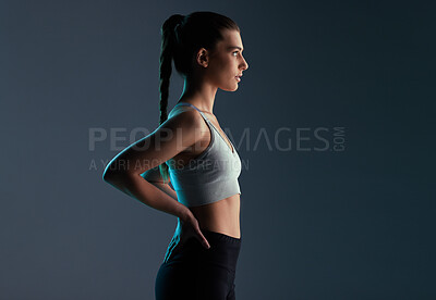 Buy stock photo Healthy model, girl and fitness in studio with activewear for workout goals, body progress and mockup space. Athlete, person and serious with sportswear for training and exercise on gray background