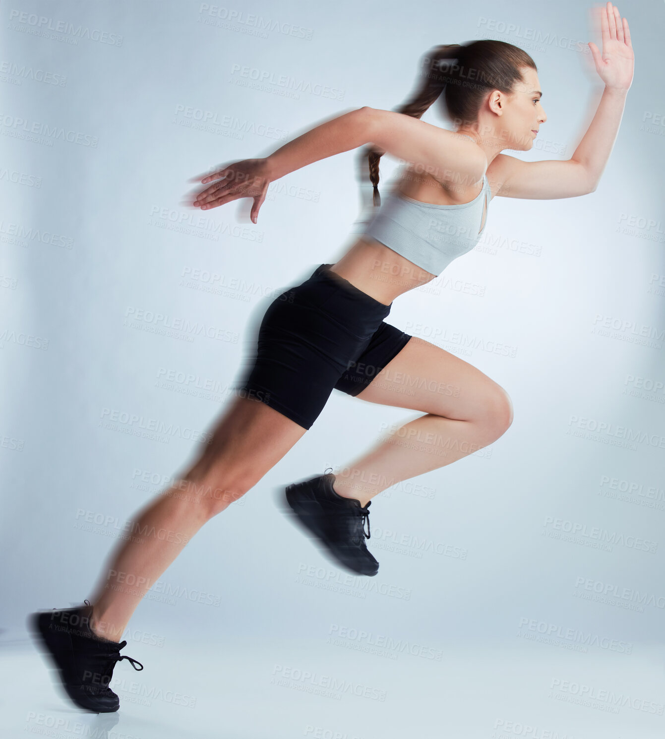 Buy stock photo Woman, fitness and running workout with speed for wellness, strong body and exercise blur in studio. Moving fast, female runner and sports training for health, power and energy by white background