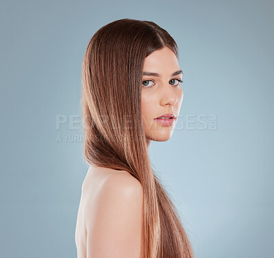 Buy stock photo Studio shot of a beautiful young woman showing off her long brown hair